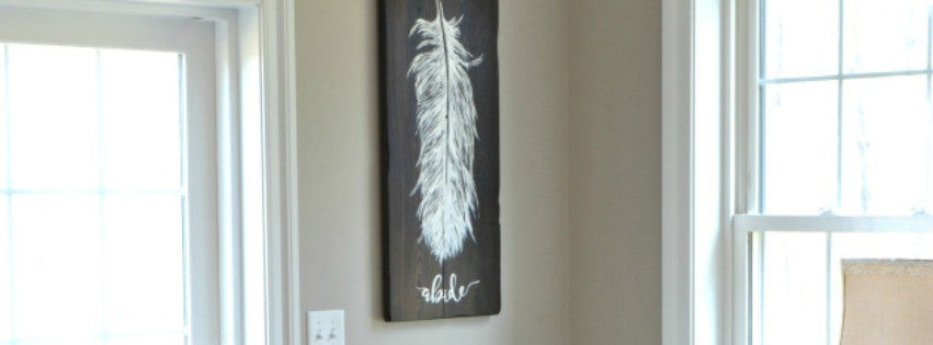 Feather painting on reclaimed wood